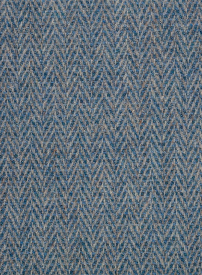 FWD 2305-B3 is a handwoven, featherweight Harris Tweed fabric in a blue & beige herringbone. A luxury wool fabric, suitable for soft furnishings and more.